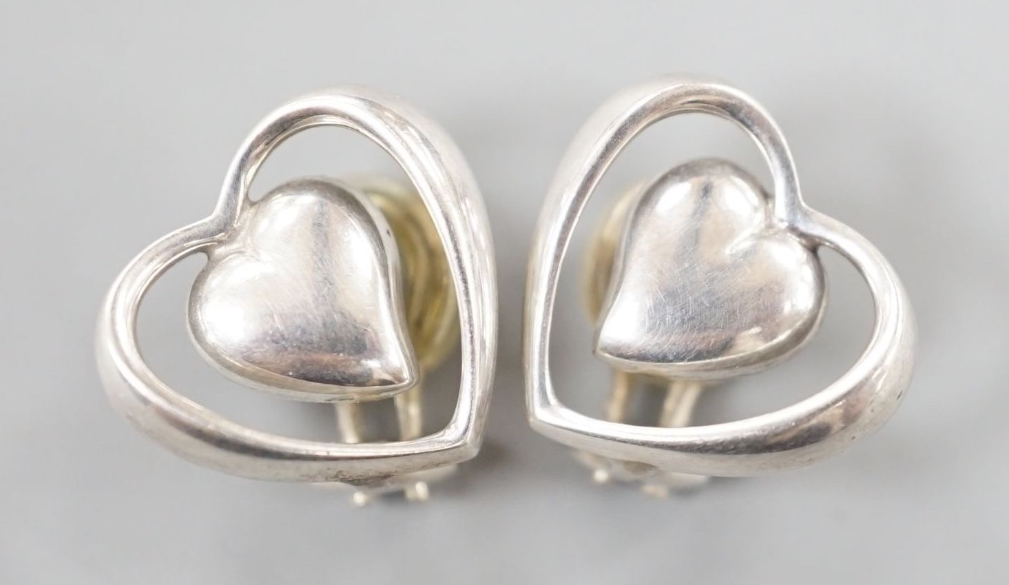 A pair of Georg Jensen sterling openwork heart ear clips, 15mm.
